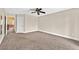 Neutral bedroom with ceiling fan, plush carpeting and base molding at 3367 Trickling Stream Cir, Las Vegas, NV 89117