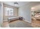 This bedroom offers natural light and a view into the living room and kitchen at 3401 Bedfordshire Pl, Las Vegas, NV 89129