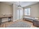 Bright bedroom features a closet and a desk at 3401 Bedfordshire Pl, Las Vegas, NV 89129