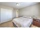 Neutral bedroom with a large closet and wood-look floors at 3401 Bedfordshire Pl, Las Vegas, NV 89129