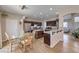Open concept kitchen boasts a central island, stainless steel appliances, and a breakfast bar at 3401 Bedfordshire Pl, Las Vegas, NV 89129