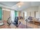 Bright studio featuring hardwood floors, high ceilings, ample lighting, and recording and music equipment at 3401 Bedfordshire Pl, Las Vegas, NV 89129