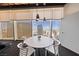 Dining area with a modern table and chairs and city views at 3726 Las Vegas Blvd # 303, Las Vegas, NV 89158