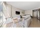 Combined living space with bright windows, modern kitchen, bed area, and contemporary furnishings at 3726 Las Vegas Blvd # 303, Las Vegas, NV 89158