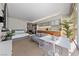 Open floor plan of condo featuring a kitchen, dining area, seating, and primary bedroom at 3726 Las Vegas Blvd # 303, Las Vegas, NV 89158