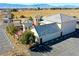 Aerial view of winery with outdoor patio, tower, parking, and desert surroundings at 3780 E Kellogg Rd, Pahrump, NV 89061