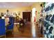 Spacious interior with hardwood floors, decorated tables and a cabinet with jewelry for a welcoming atmosphere at 3780 E Kellogg Rd, Pahrump, NV 89061