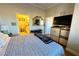 Comfortable main bedroom with an ensuite bathroom and TV; a relaxing retreat at 3780 E Kellogg Rd, Pahrump, NV 89061