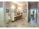 Commercial restroom with multiple sinks, and neutral tile floors, offering practicality and cleanliness for public or business use at 3780 E Kellogg Rd, Pahrump, NV 89061