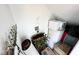 A cluttered storage area under the stairs with boxes, rolled carpet, and golf clubs for all your organizational needs at 3780 E Kellogg Rd, Pahrump, NV 89061