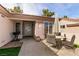 Inviting patio area with table, chairs, and shade umbrella at 425 Golden State St, Henderson, NV 89012