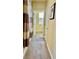 Hallway featuring carpet flooring, a bathroom entry and a hanging shower curtain at 4488 Mission Meadow Cir, Las Vegas, NV 89139