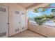 Outdoor balcony with multiple access doors and urban views at 4861 S Torrey Pines Dr # 201, Las Vegas, NV 89103