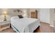 Bedroom showcasing hardwood floors and neutral decor at 4861 S Torrey Pines Dr # 201, Las Vegas, NV 89103
