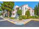 Exterior view of property featuring private balconies and landscaped grounds at 4861 S Torrey Pines Dr # 201, Las Vegas, NV 89103