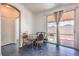 Bright dining area with sliding glass door access to the backyard patio at 5087 Midnight Oil Dr, Las Vegas, NV 89122