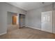 Bedroom view showcasing carpet floors, closet, and entrance at 5250 S Rainbow Blvd # 2165, Las Vegas, NV 89118