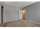 Bedroom with neutral paint and carpet and an entry door at 5250 S Rainbow Blvd # 2165, Las Vegas, NV 89118