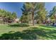 Enjoy the community's lush lawns and mature trees, creating a beautiful backdrop for outdoor activities at 5250 S Rainbow Blvd # 2165, Las Vegas, NV 89118