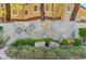 Stone sign for the Spanish Palms condominiums complex, enhanced with lush landscaping at 5250 S Rainbow Blvd # 2165, Las Vegas, NV 89118