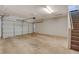 Spacious two car garage with an automatic door and access to interior stairs at 5250 S Rainbow Blvd # 2165, Las Vegas, NV 89118