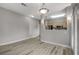 Open living room features view to the kitchen with stainless appliances at 5250 S Rainbow Blvd # 2165, Las Vegas, NV 89118