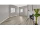 Bright living room features a fireplace, modern flooring and neutral paint at 5250 S Rainbow Blvd # 2165, Las Vegas, NV 89118
