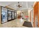 The well-maintained lobby features neutral decor, tile flooring, and ample natural light at 5250 S Rainbow Blvd # 2165, Las Vegas, NV 89118