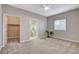 Spacious main bedroom with carpet, ensuite bathroom, and walk-in closet at 5250 S Rainbow Blvd # 2165, Las Vegas, NV 89118