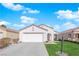 Charming single-story home with a two-car garage and well-maintained front lawn at 5846 Dana Rogers Dr, Las Vegas, NV 89110