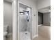 This bathroom features a tiled shower with a rain shower head and decorative mosaic floor at 60 E Jaybird St, Pahrump, NV 89048