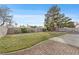 Spacious backyard featuring lush green grass and privacy from block wall at 6413 Chippindale Ln, Las Vegas, NV 89108