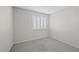 Empty bedroom offers carpeted floors, neutral paint and bright natural light at 6413 Chippindale Ln, Las Vegas, NV 89108
