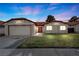 Charming single-story home featuring a well-maintained lawn and a two-car garage at 6413 Chippindale Ln, Las Vegas, NV 89108