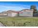 Charming single-story home with a well-maintained lawn and a two-car garage at 6413 Chippindale Ln, Las Vegas, NV 89108