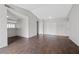 Open living room with tile floors and lots of natural light at 6413 Chippindale Ln, Las Vegas, NV 89108