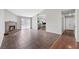 Spacious living room with a cozy fireplace and tile floors at 6413 Chippindale Ln, Las Vegas, NV 89108