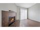 Cozy living room featuring a fireplace and sliding door to the backyard at 6413 Chippindale Ln, Las Vegas, NV 89108