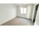 Bedroom featuring neutral carpets, white paint, and closet with sliding doors at 6533 Adonis Heights Ave, North Las Vegas, NV 89086