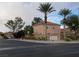 Tesoro community sign with palm trees, desert landscaping, and neighborhood street view at 6533 Adonis Heights Ave, North Las Vegas, NV 89086