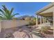 Well-maintained backyard with drought-resistant landscaping and a covered patio, perfect for outdoor living at 7331 Abundant Harvest Ave, Las Vegas, NV 89131