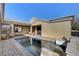 A private pool offers a refreshing escape in this beautifully designed backyard at 7331 Abundant Harvest Ave, Las Vegas, NV 89131