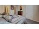 Bedroom featuring a well-lit space with a comfortable bed, neutral colors at 7331 Abundant Harvest Ave, Las Vegas, NV 89131