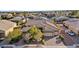 Beautiful home featuring a three-car garage, desert landscaping, and a brick driveway at 7331 Abundant Harvest Ave, Las Vegas, NV 89131