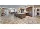 A generously sized gourmet kitchen featuring granite countertops and high-end stainless steel appliances at 7331 Abundant Harvest Ave, Las Vegas, NV 89131