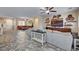 Spacious living room with large sectional sofa, ceiling fan and custom decor at 7331 Abundant Harvest Ave, Las Vegas, NV 89131