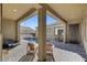 Covered patio with pavers, a beautiful pool, and comfortable seating at 7331 Abundant Harvest Ave, Las Vegas, NV 89131