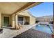 Private pool with a patio area that includes lounge chairs and a covered space at 7331 Abundant Harvest Ave, Las Vegas, NV 89131