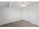 Bedroom with a ceiling fan, neutral carpet and closet with sliding doors at 7501 Bush Garden Ave, Las Vegas, NV 89129