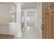 Bright foyer with tiled floor leading to open living spaces and soaring ceilings at 7501 Bush Garden Ave, Las Vegas, NV 89129